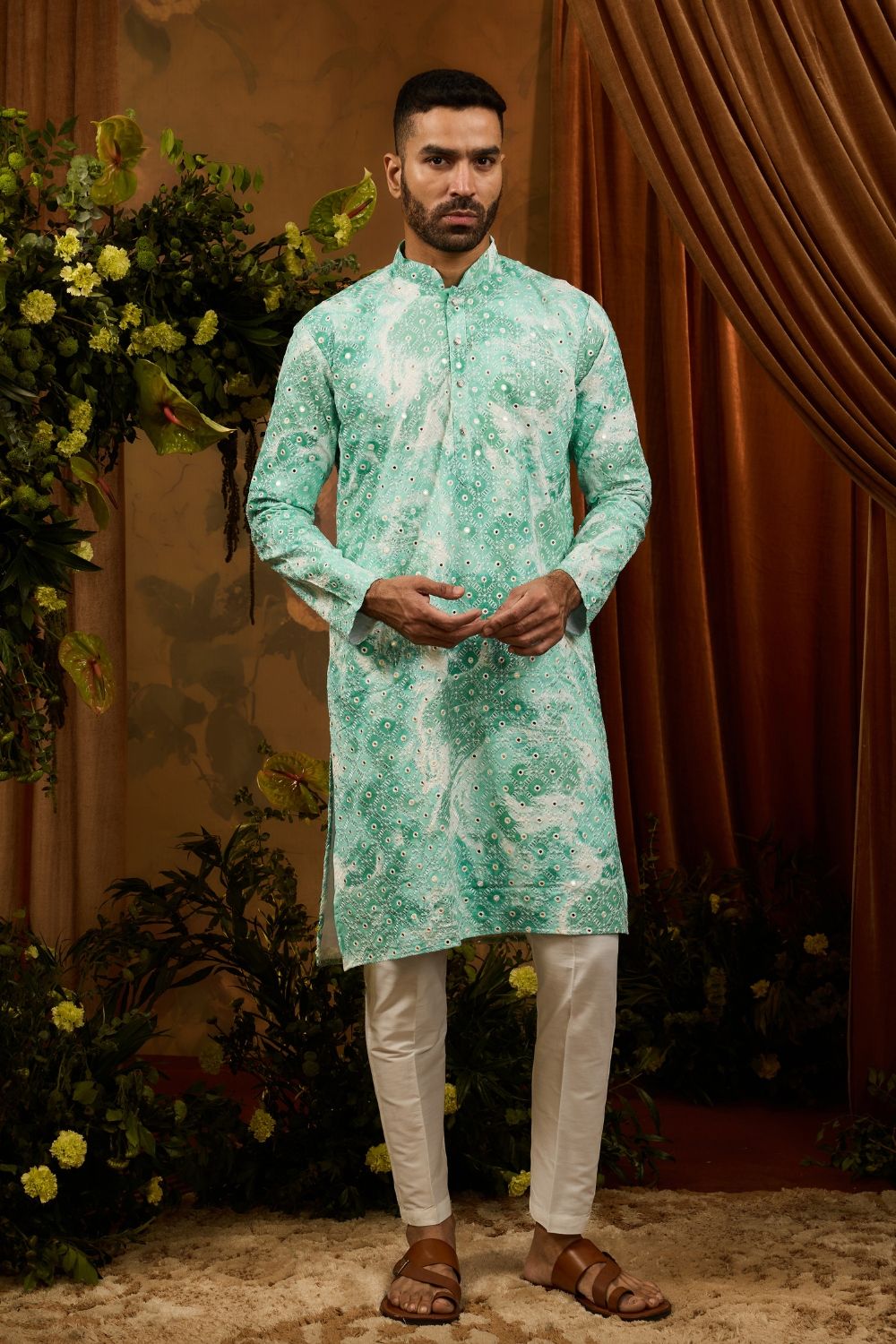 Blue silk kurta pajama set with white embroidery and mirror machine work