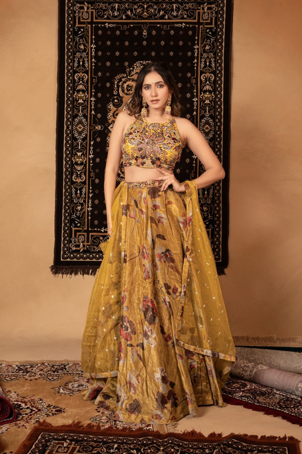 Yellow tissue silk lehenga choli with knot and cut dana work