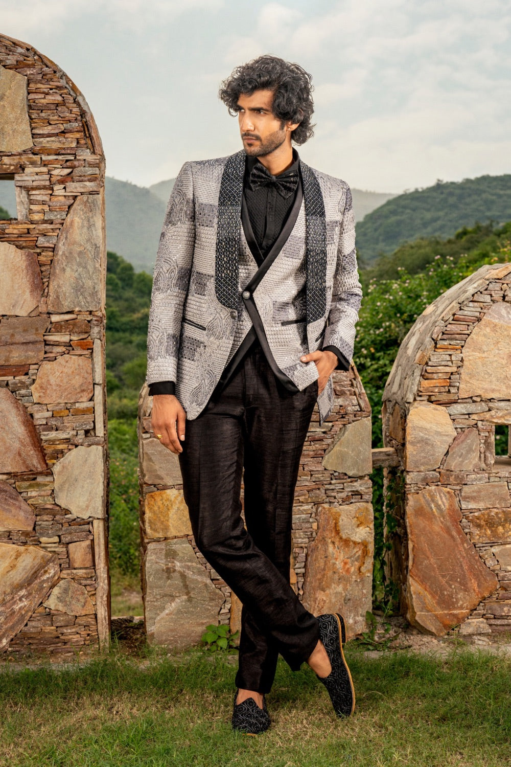 Black & grey suiting tuxedo with thread embroidery and hand cut dana work