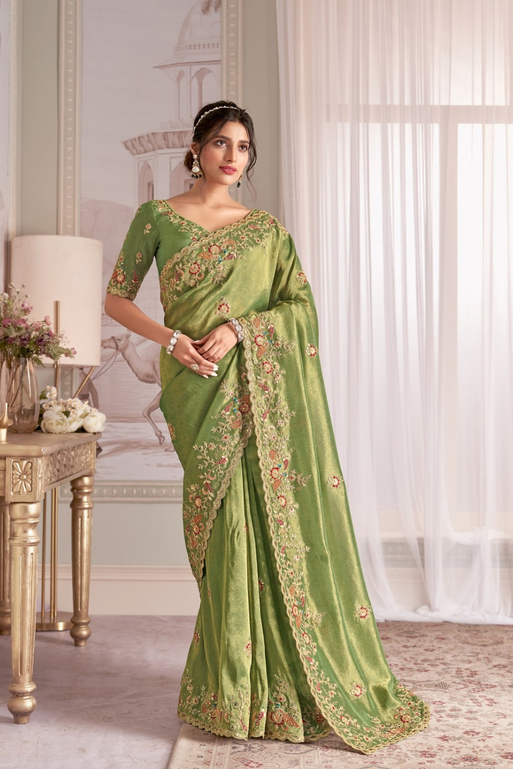 Green banarasi silk saree with matching unstitched blouse