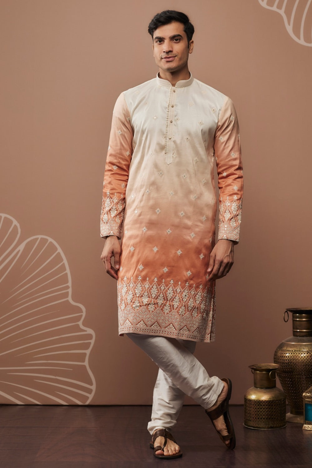 Orange shaded silk kurta & pajama with hand and machine work