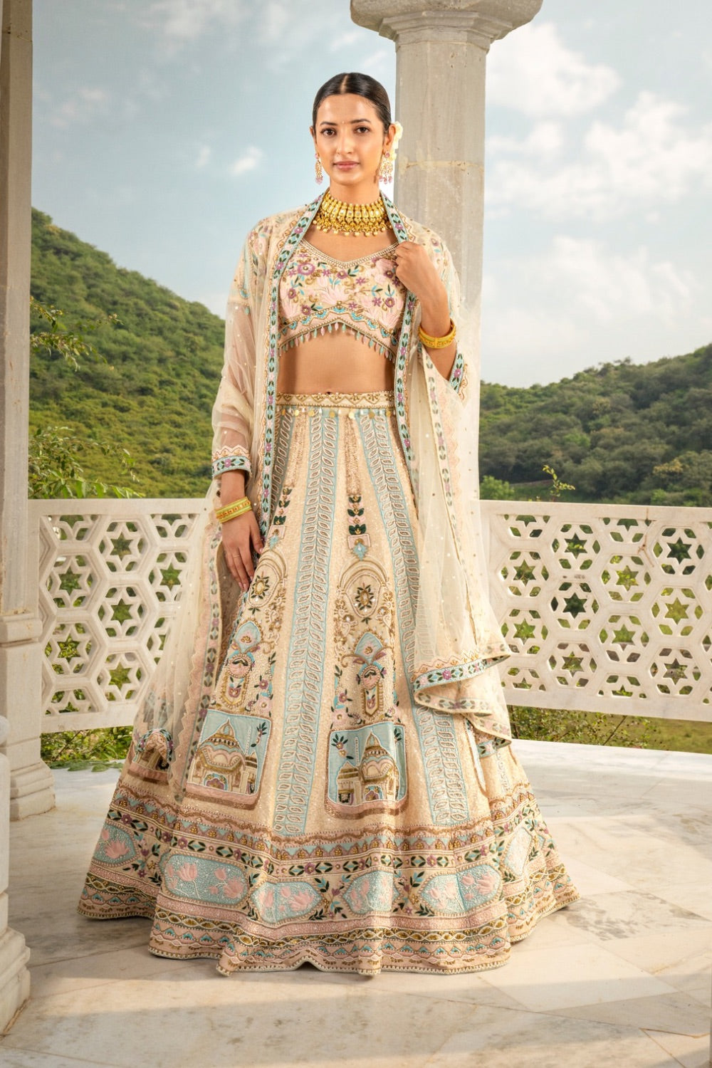 Cream raw silk zardozi embroidered lehenga choli with sequin, hand cut dana, thread and pearl work