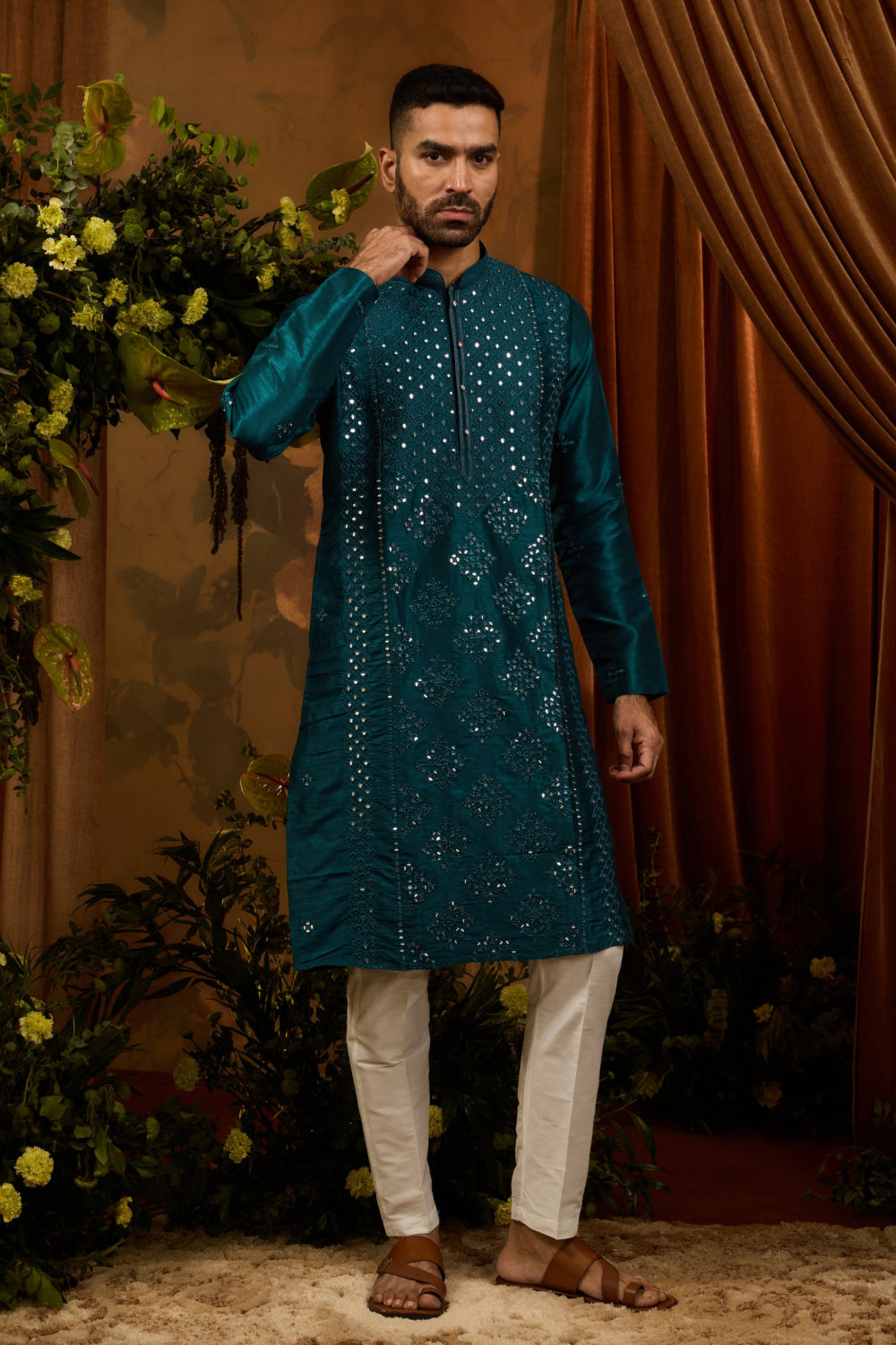 Deep teal silk kurta set with thread and mirror work