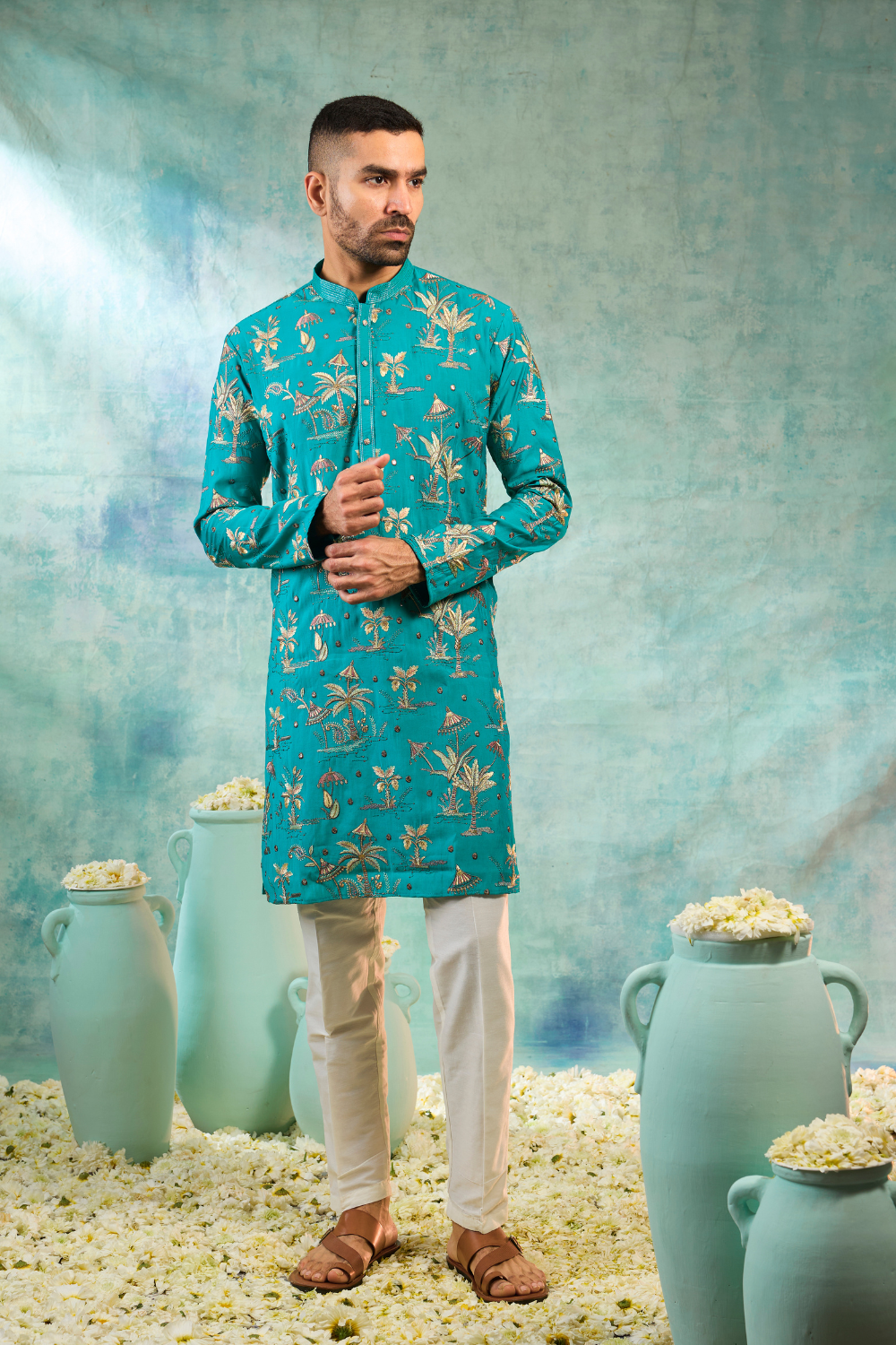 Turquoise silk kurta set with golden details