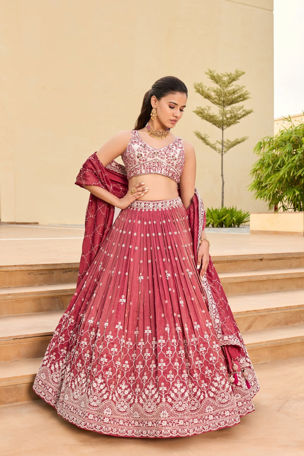 Dusty rose pink silk lehenga choli with sequins and hand cut dana work