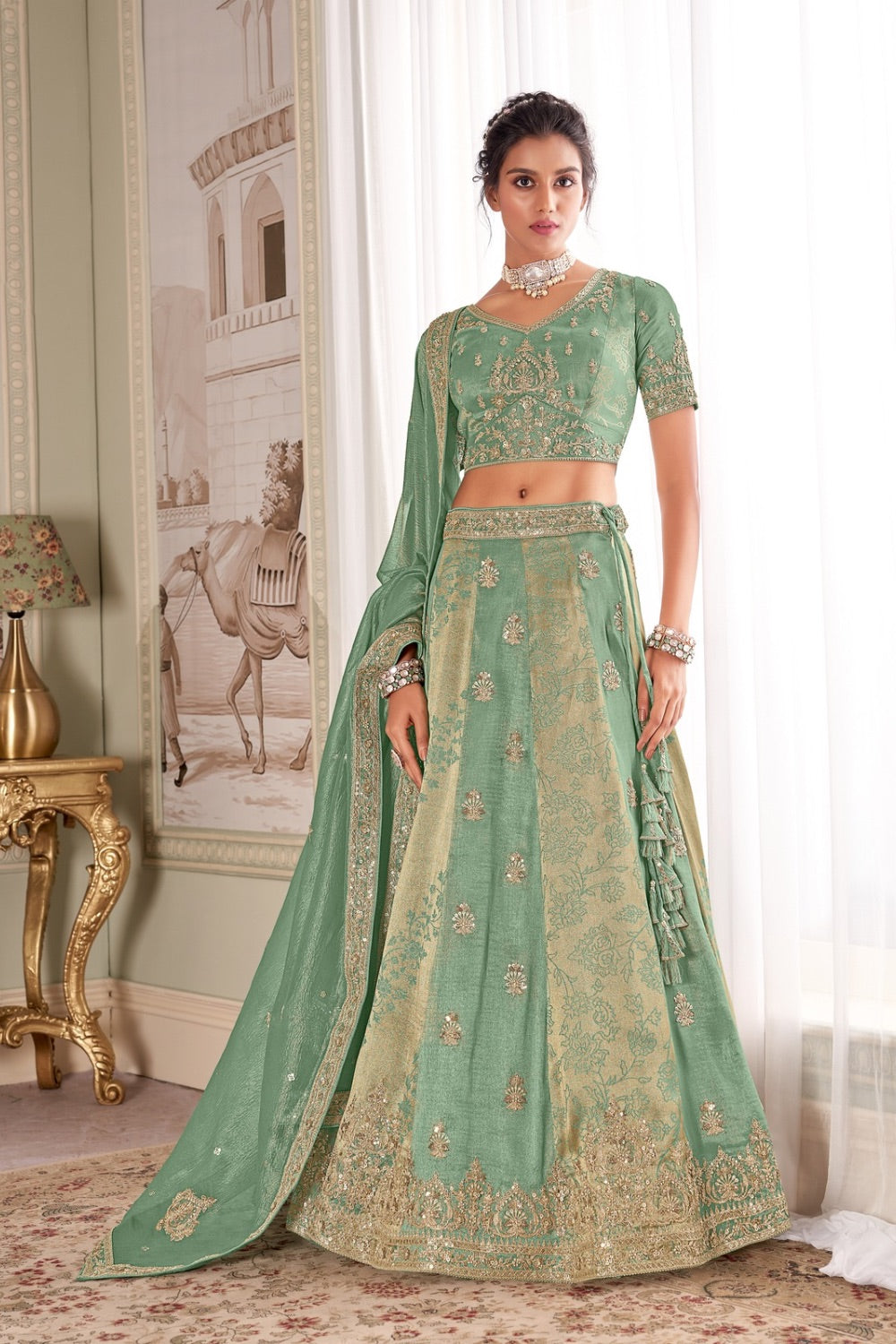 Sage Green tissue silk lehenga choli with machine work