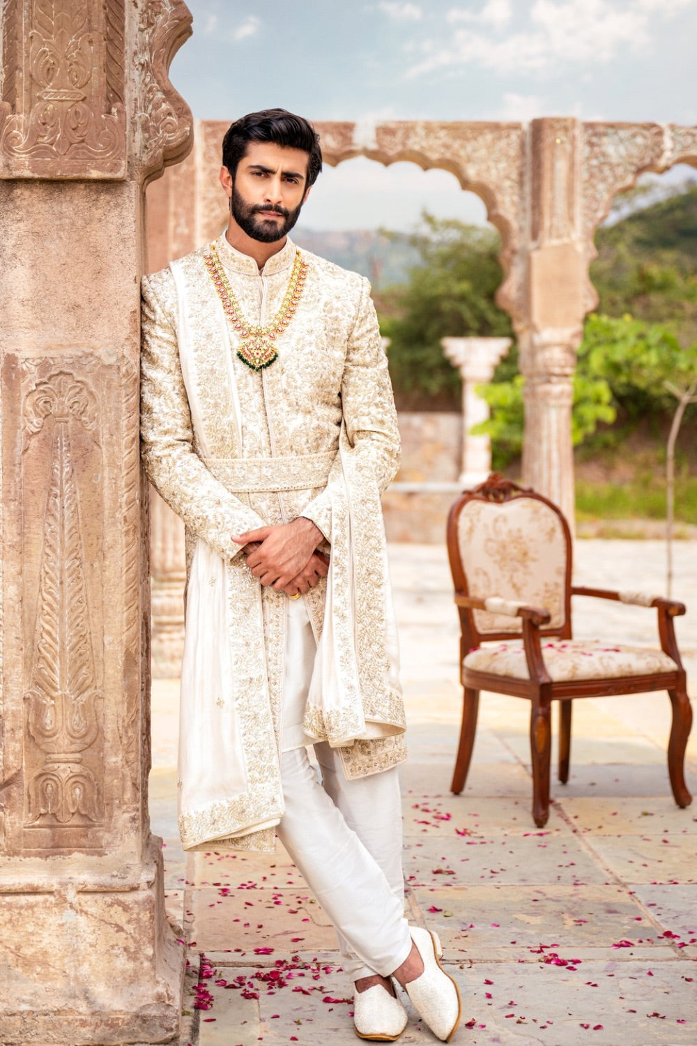 Ivory silk zardozi embroidered sherwani with moti work