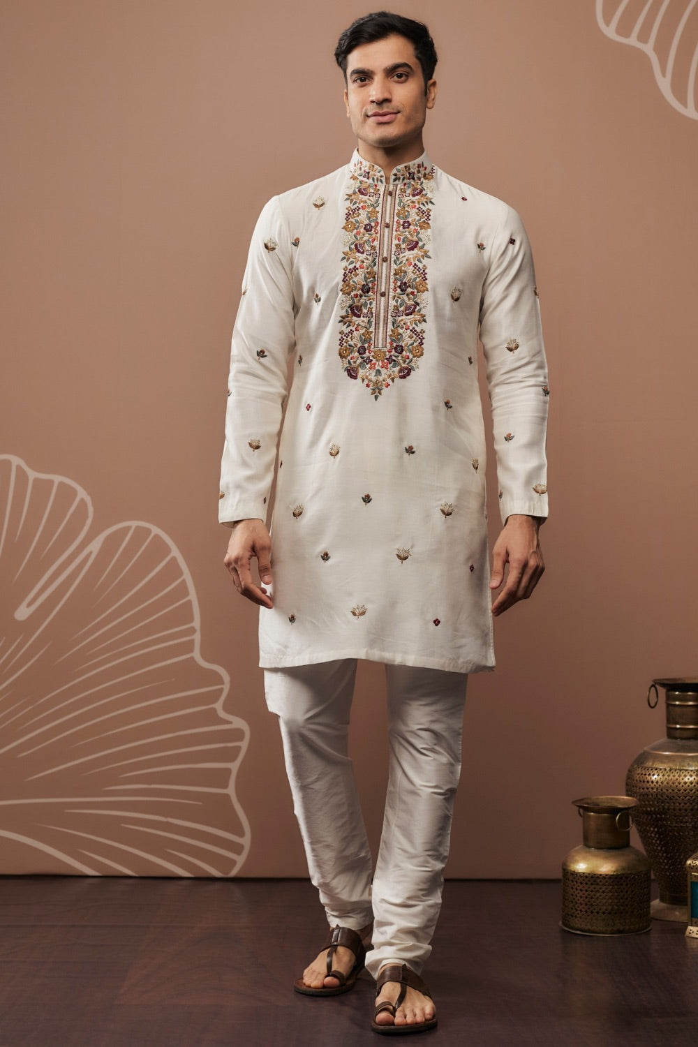 White silk kurta set with hand and machine work