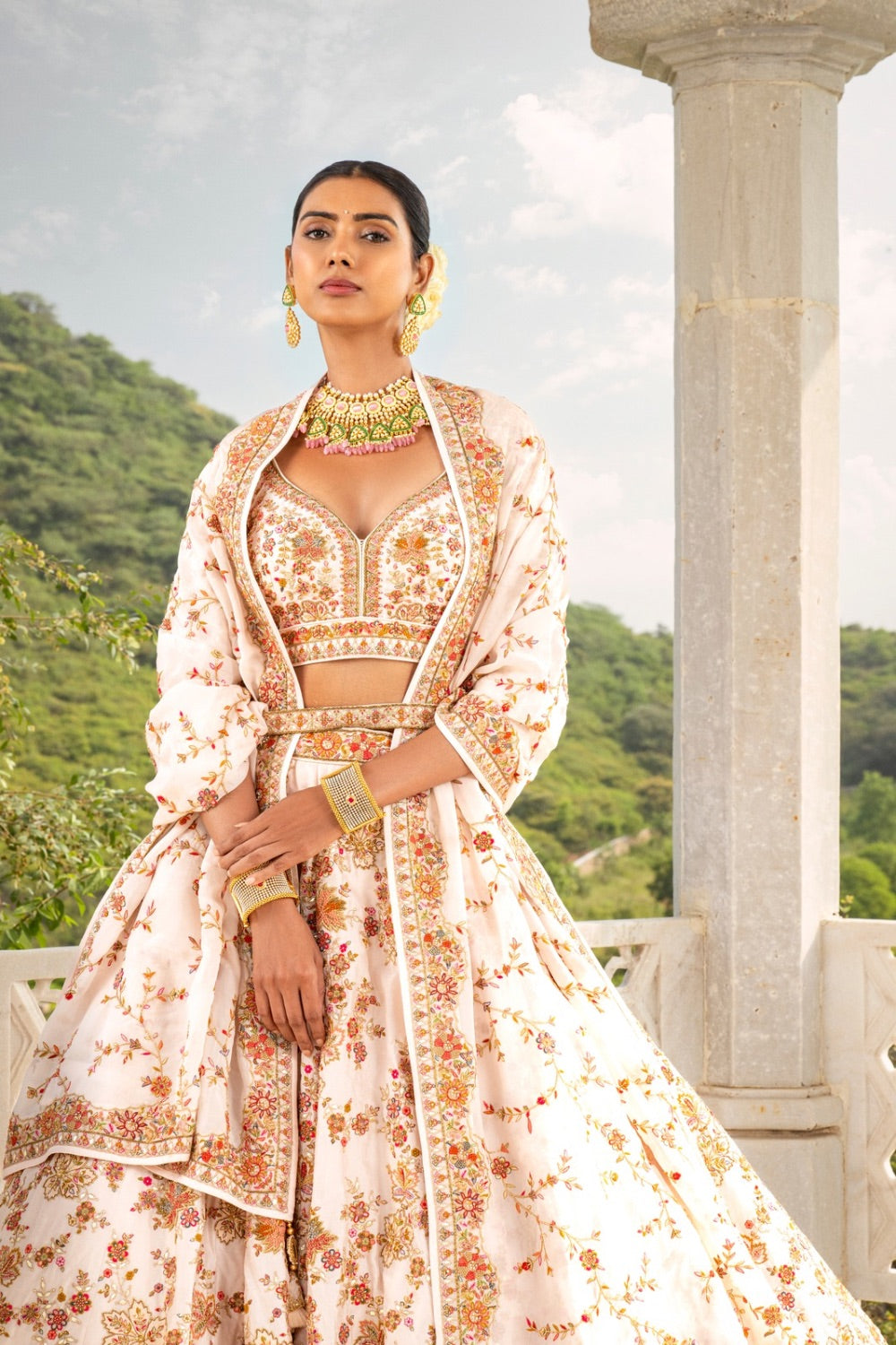 Off-White silk lehenga choli with zardozi, pearl, resham and cut dana work