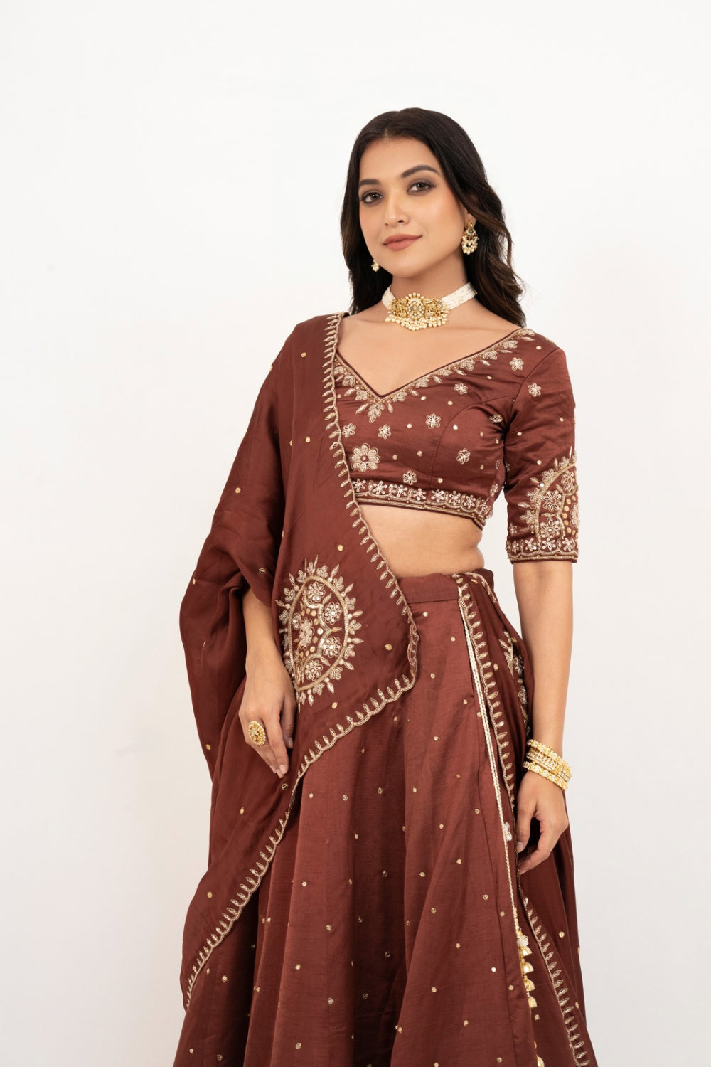 Brown soft silk zardozi embroidered lehenga choli with hand cut dana