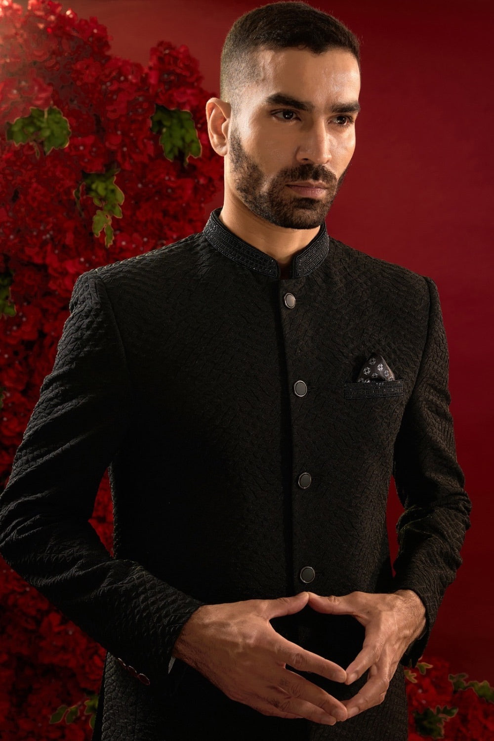 Black silk suit with hand work on neckline and pocket