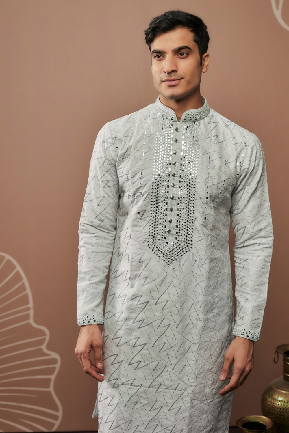 White silk kurta set with hand and machine work