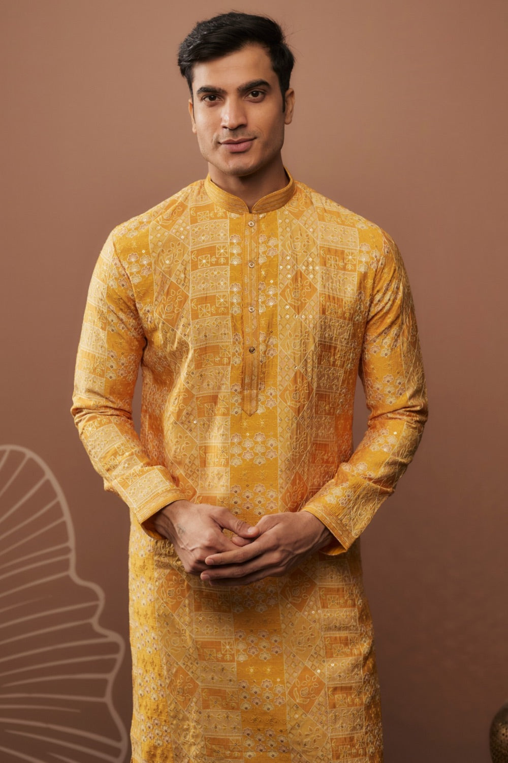 Bright yellow silk kurta and pajama with hand and machine work