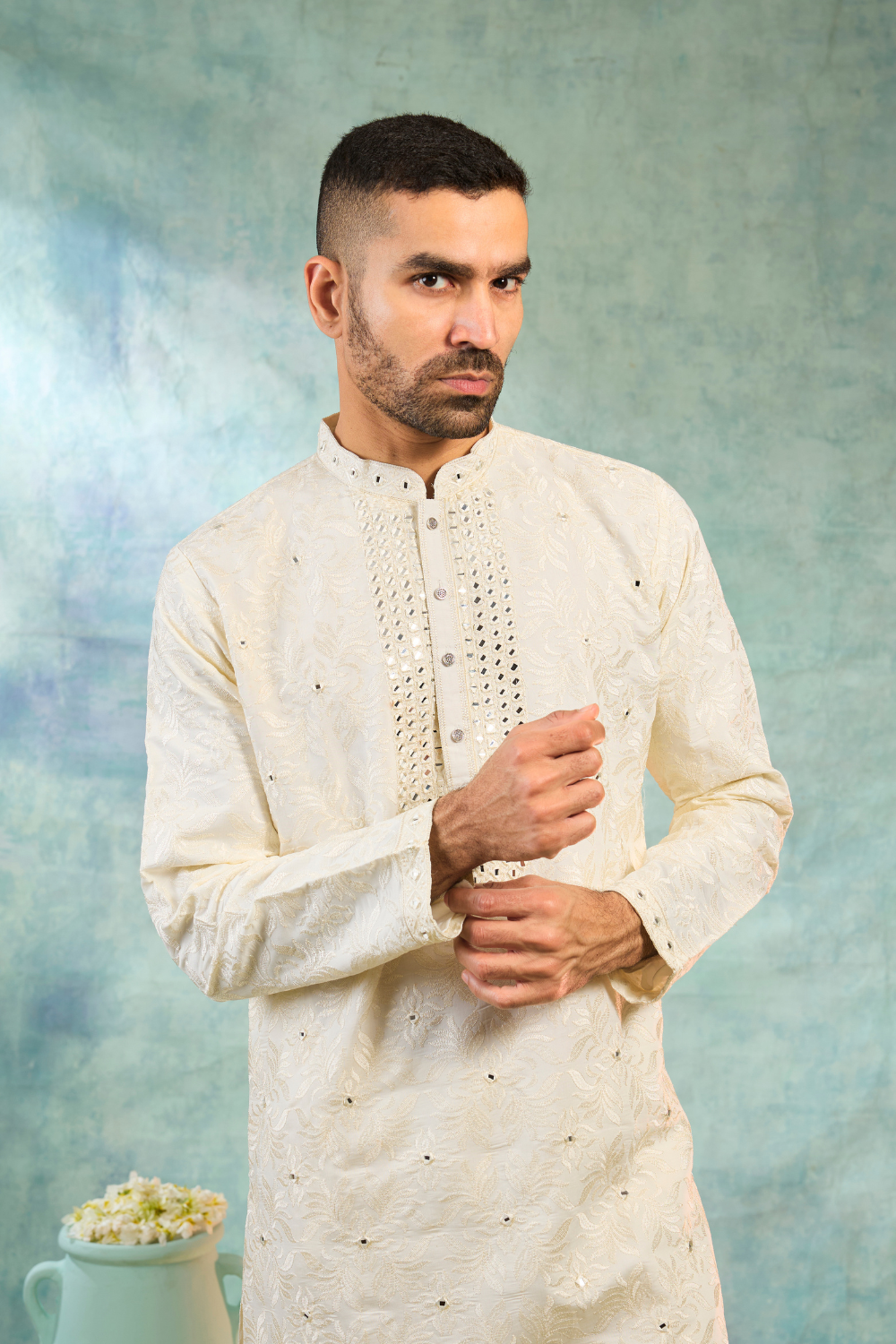 Ivory kurta set with thread embroidery and mirror work