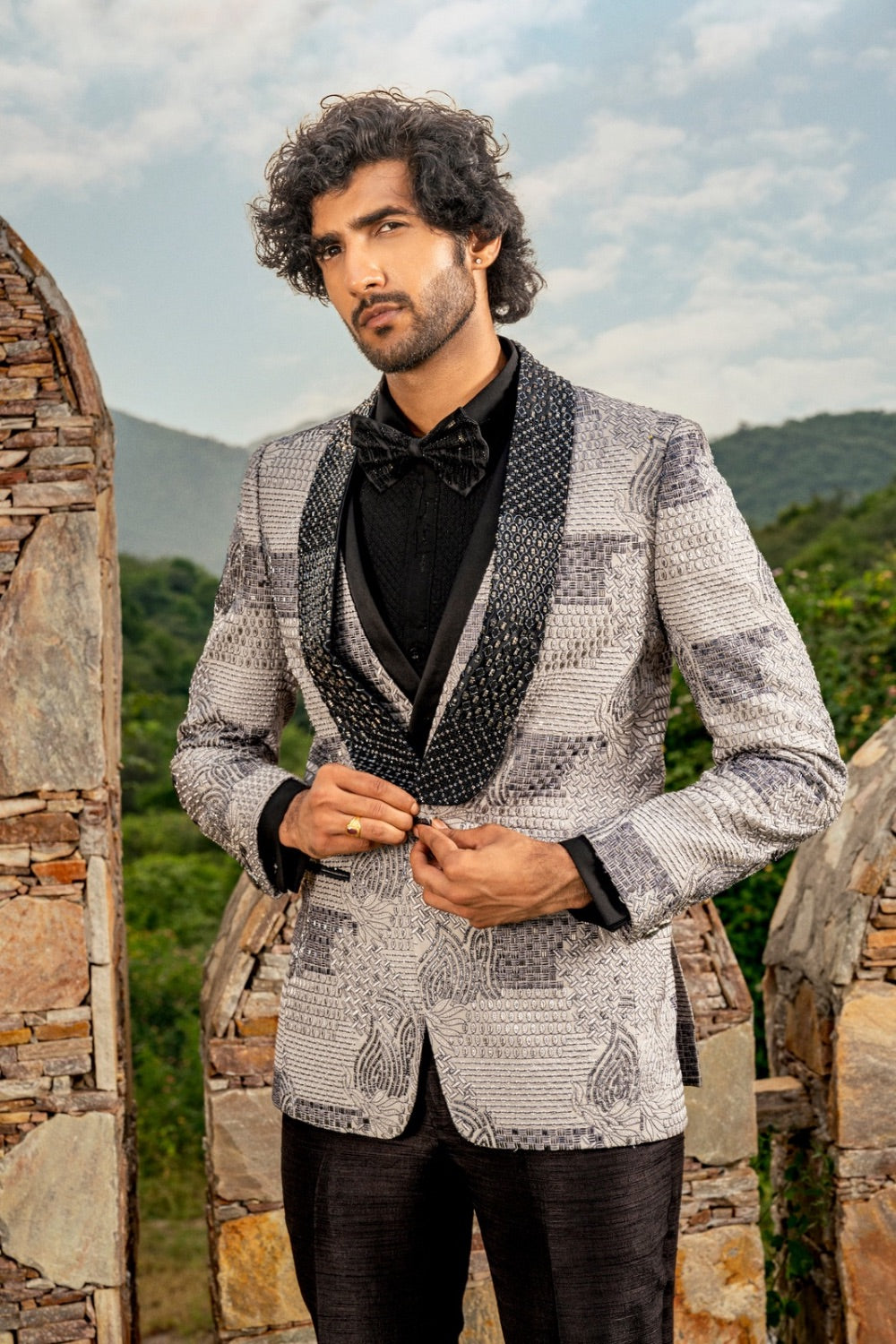 Black & grey suiting tuxedo with thread embroidery and hand cut dana work