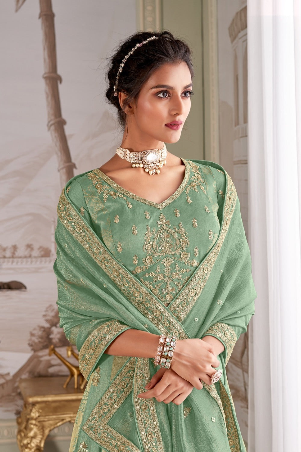 Sage Green tissue silk lehenga choli with machine work