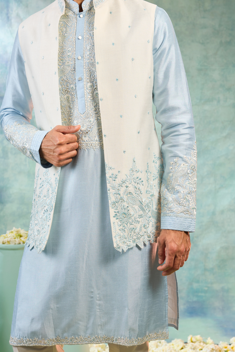 Baby blue silk kurta and pearl white koti with mirror embroidery and thread work