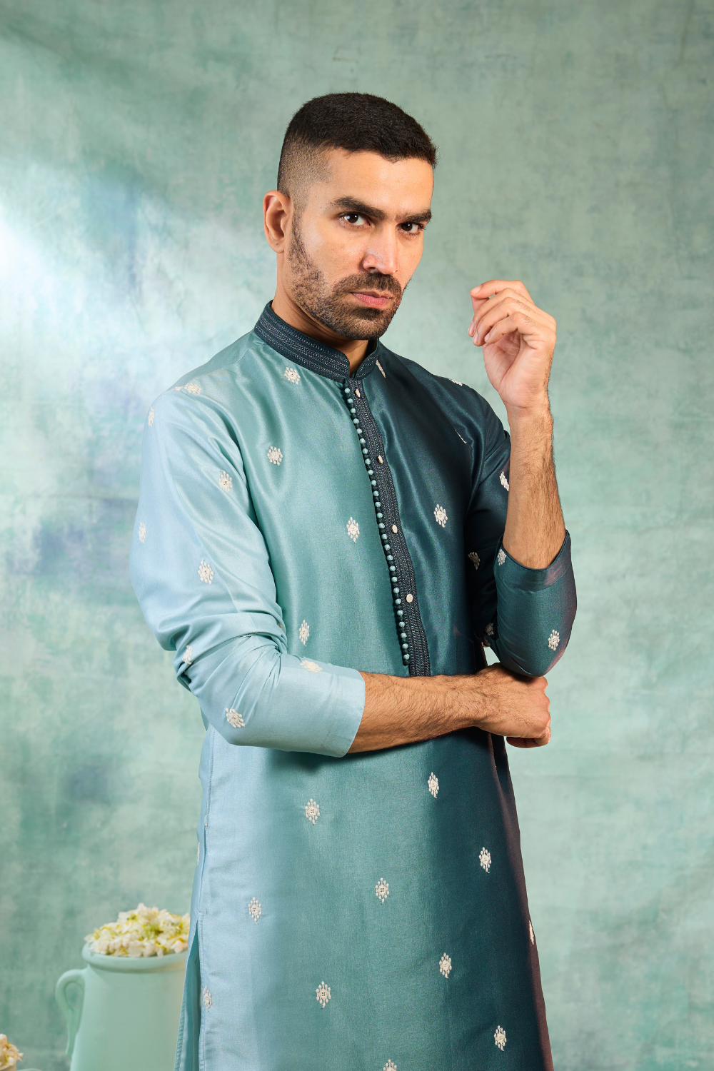 Blue silk kurta set with white motifs