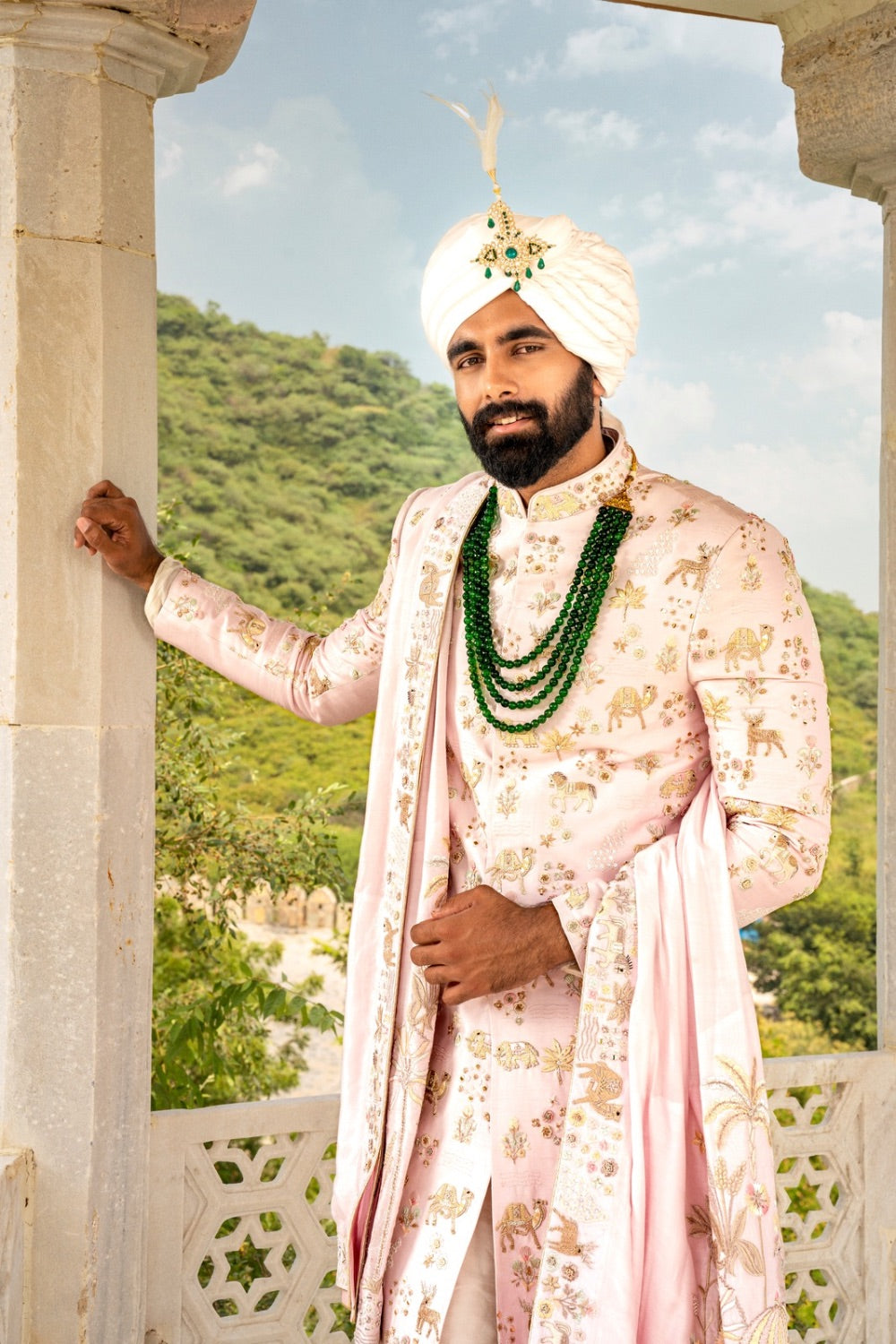 Light pink silk sherwani with pearl and hand cut dana work