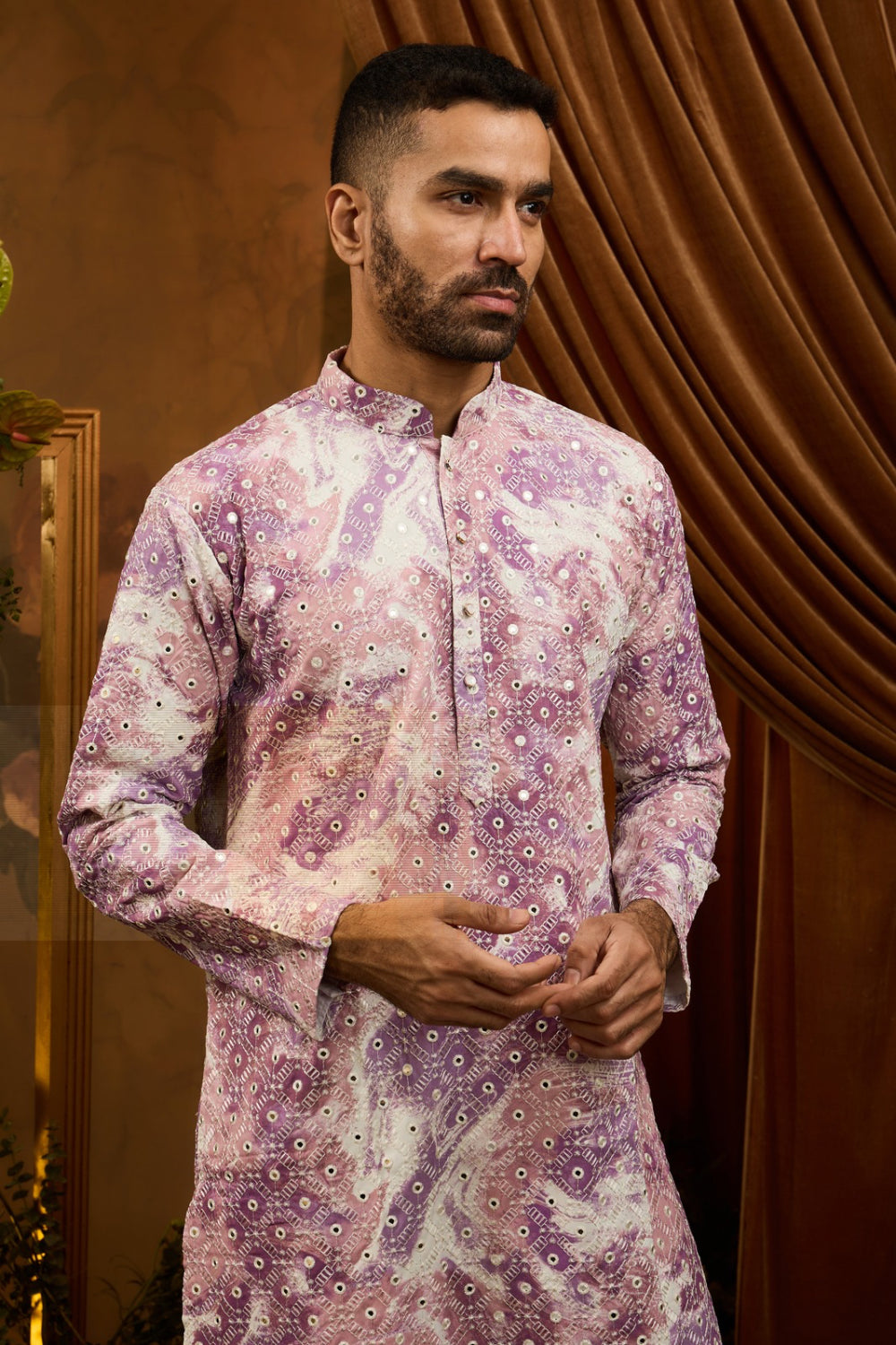 Purple silk kurta pajama set with white embroidery and mirror work