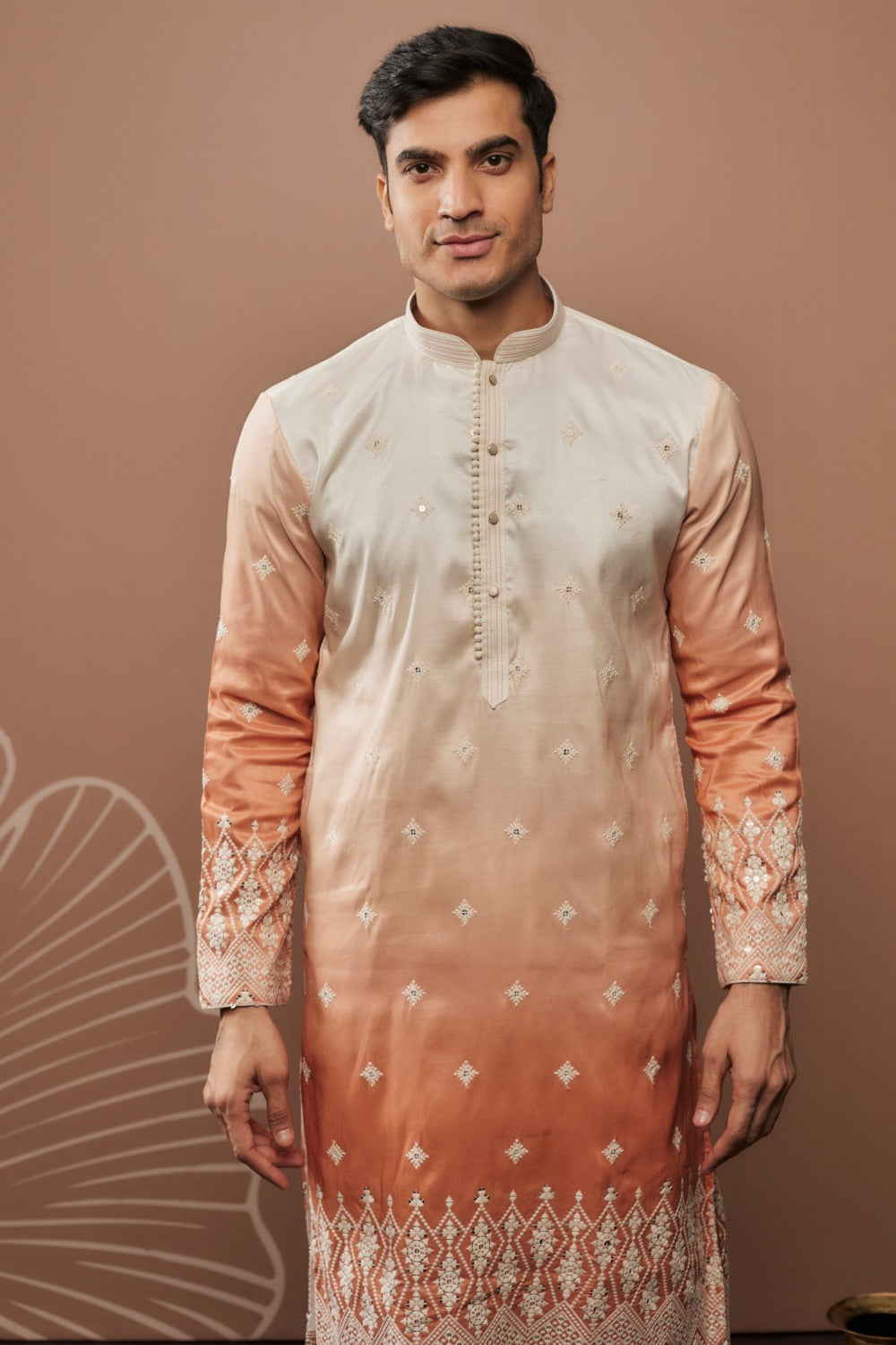 Orange shaded silk kurta & pajama with hand and machine work