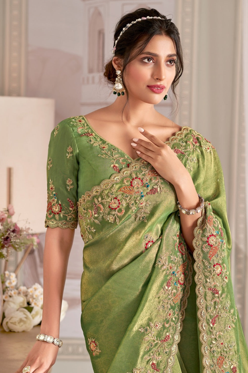 Green banarasi silk saree with matching unstitched blouse