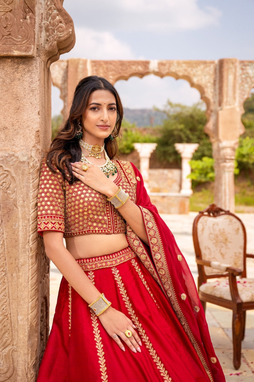 Red silk bridal lehenga choli with zari and resham work