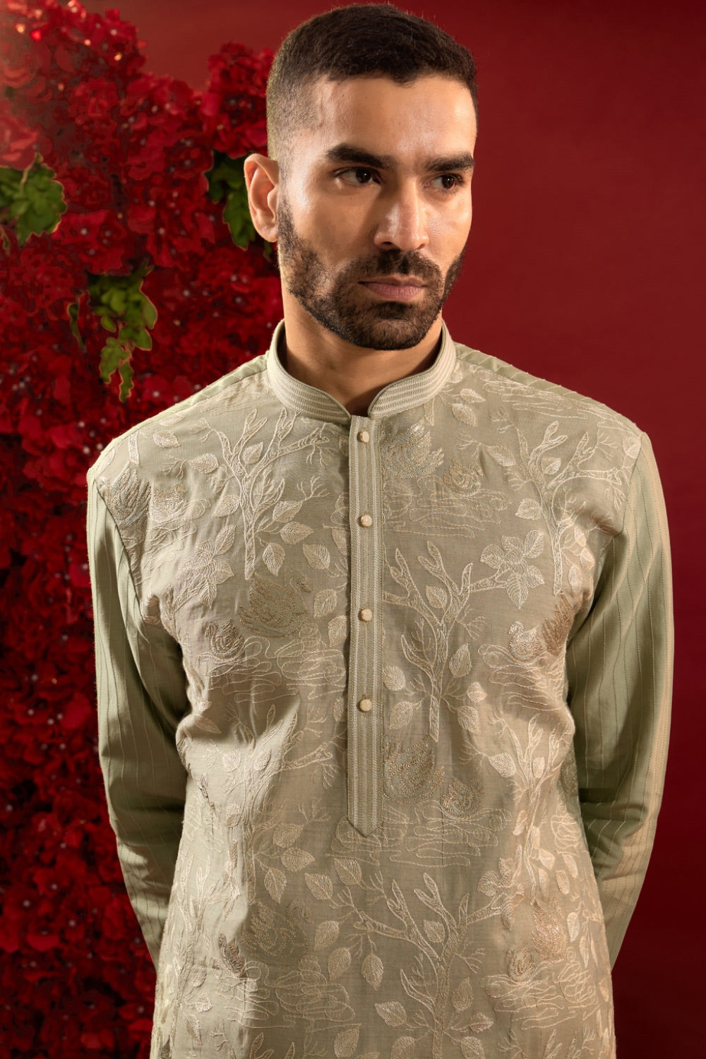 Sage green silk kurta set with machine work