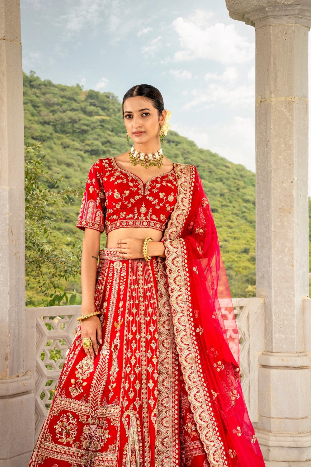 Red raw silk lehenga choli with zardozi and cut dana work