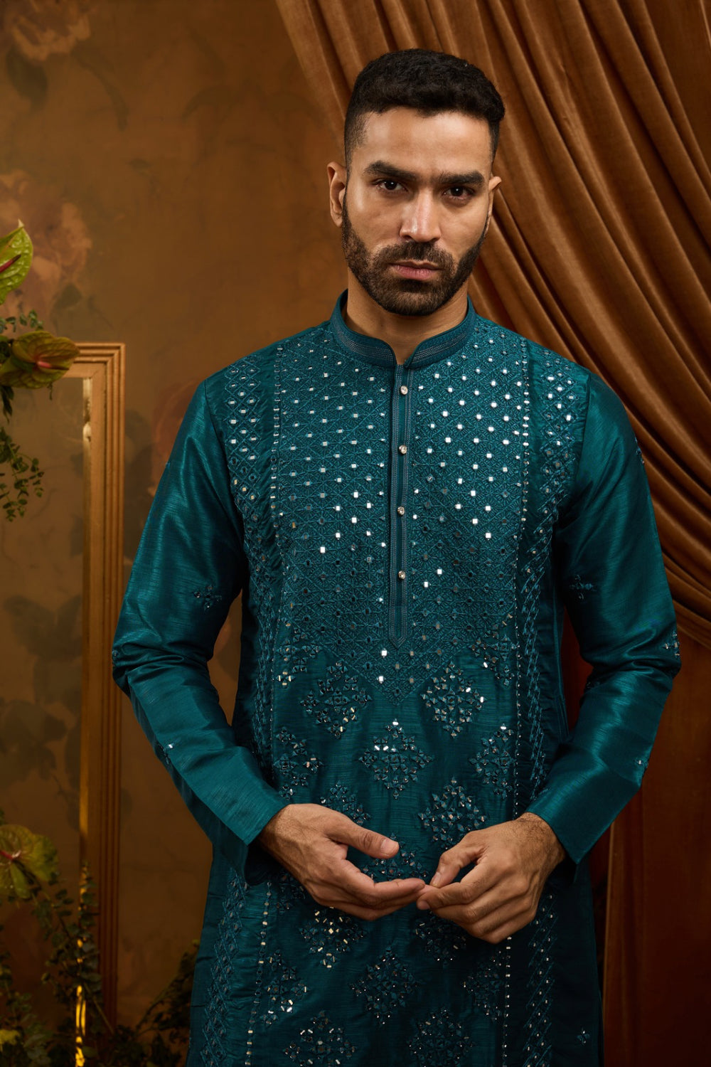 Deep teal silk kurta set with thread and mirror work