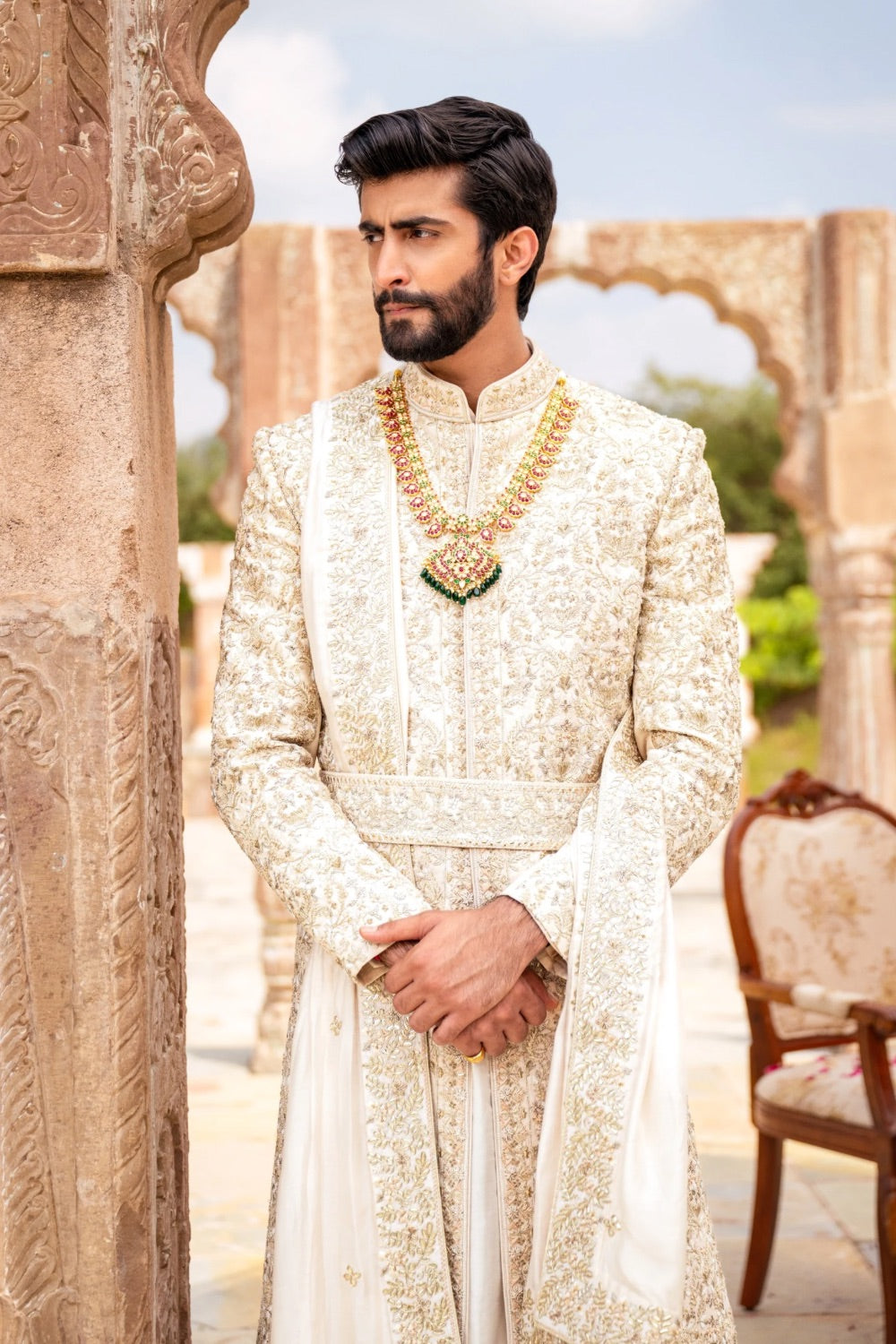 Ivory silk zardozi embroidered sherwani with moti work