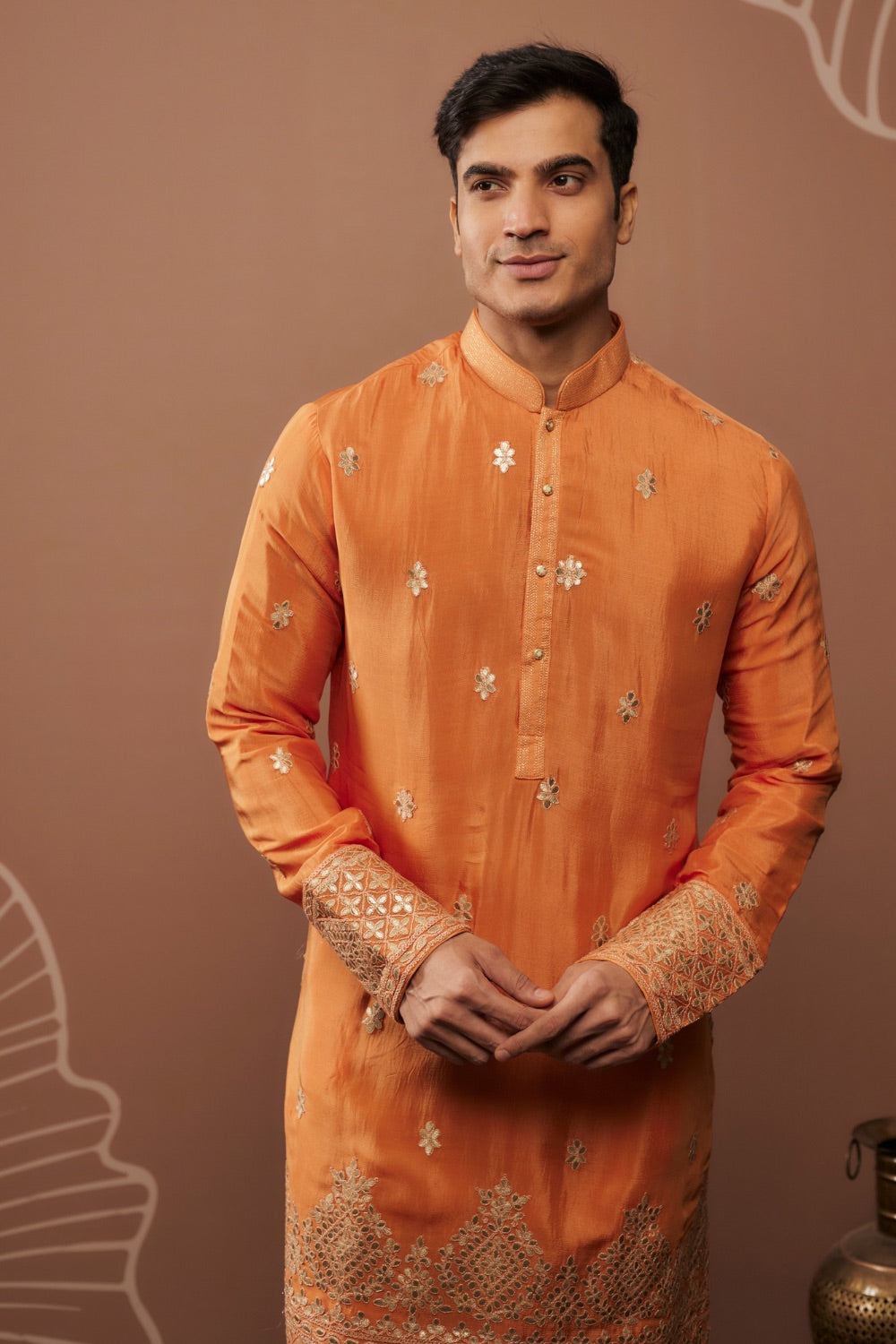 Orange silk kurta set with hand and machine work