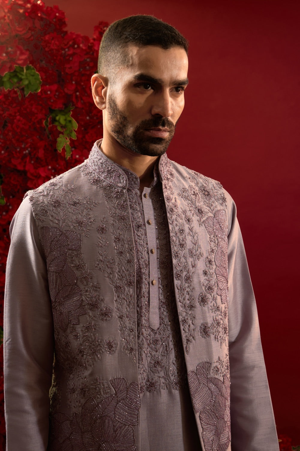 Mauve silk sherwani with detailed hand and machine work