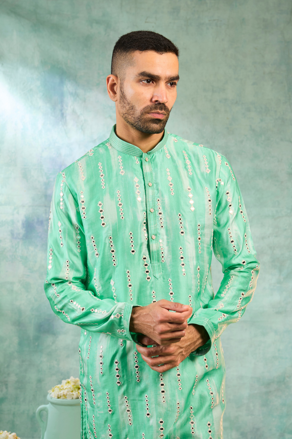 Sea green silk kurta set with off white thread work and mirror work