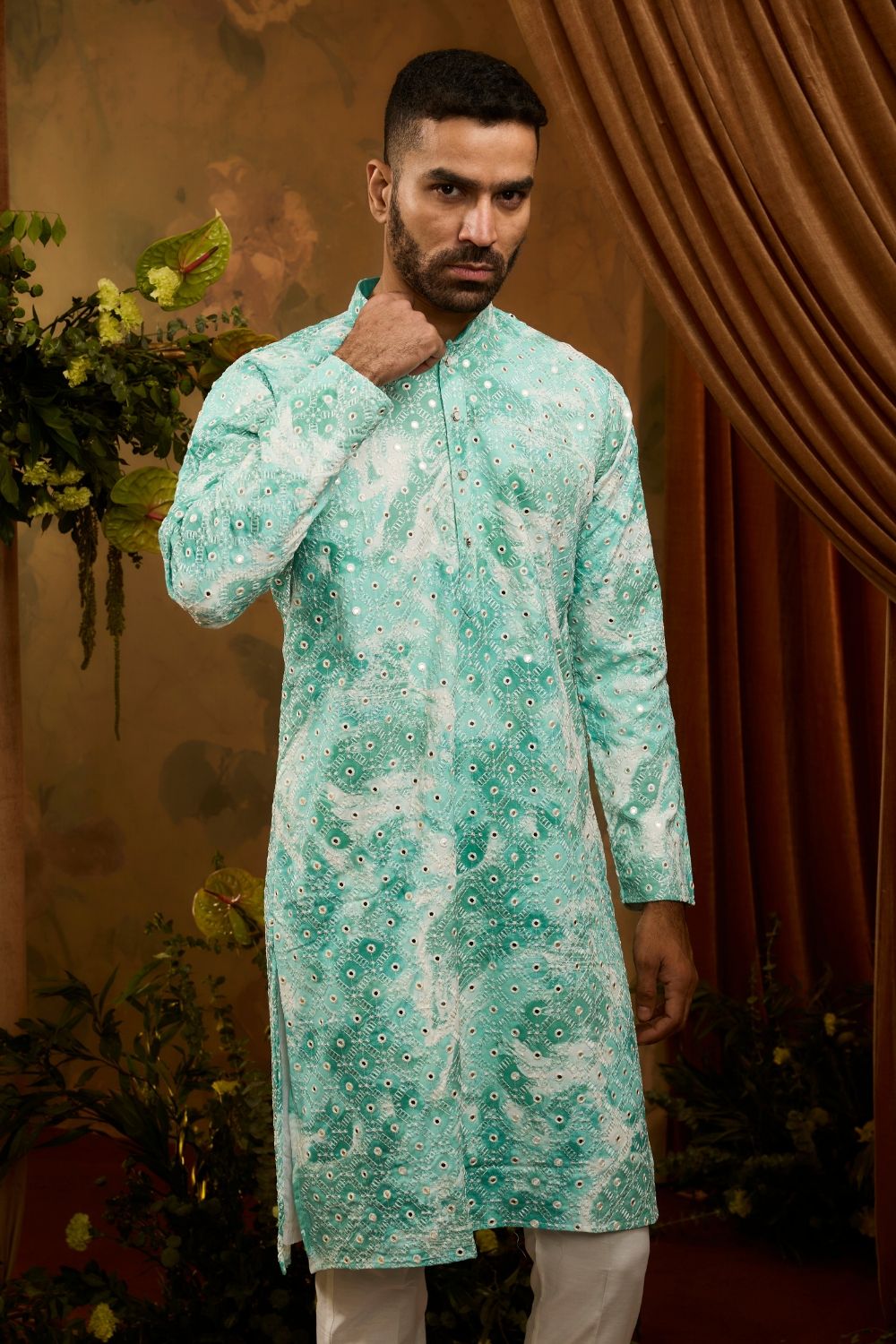 Blue silk kurta pajama set with white embroidery and mirror machine work