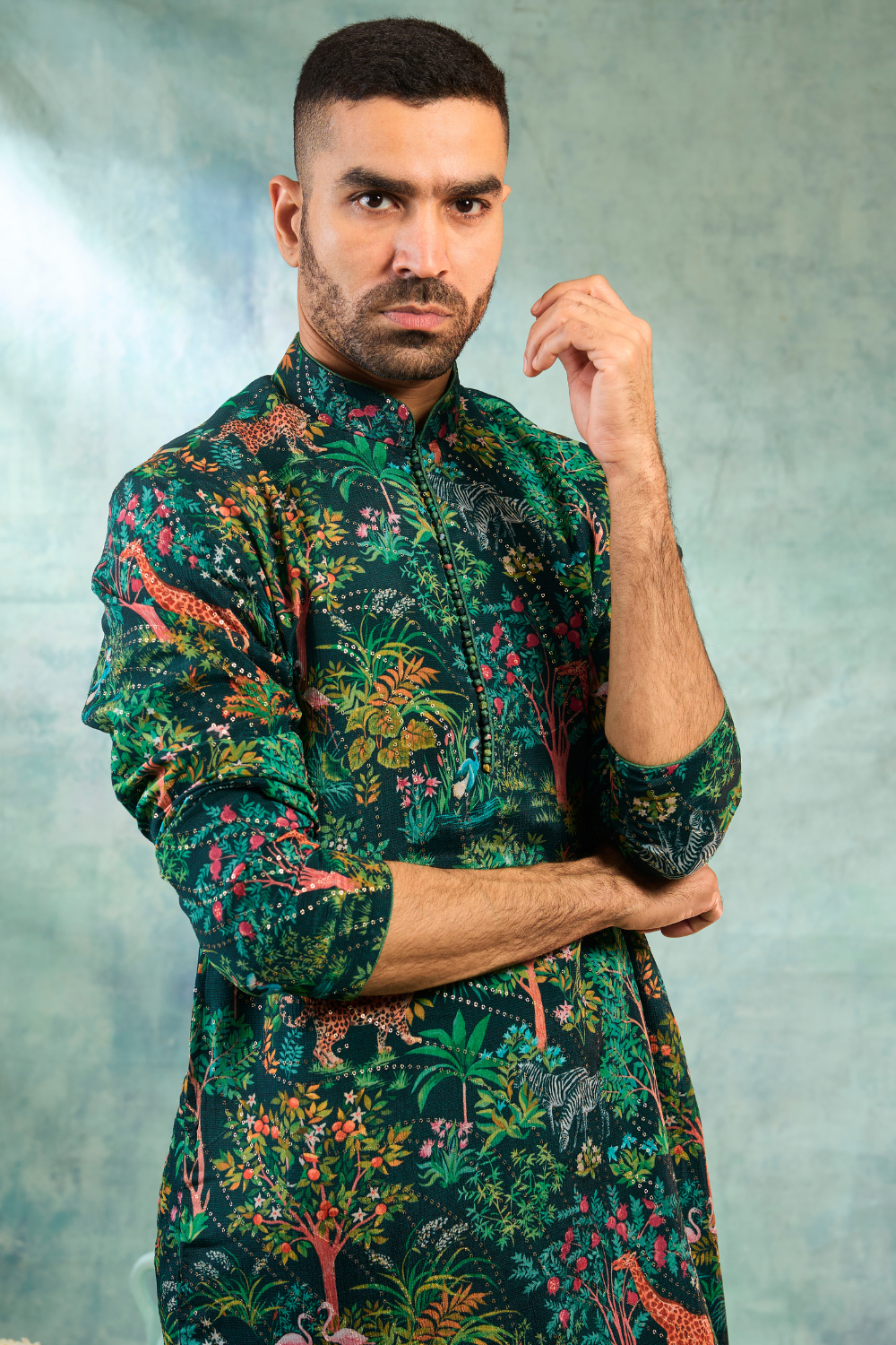 Deep green kurta set with forest print work