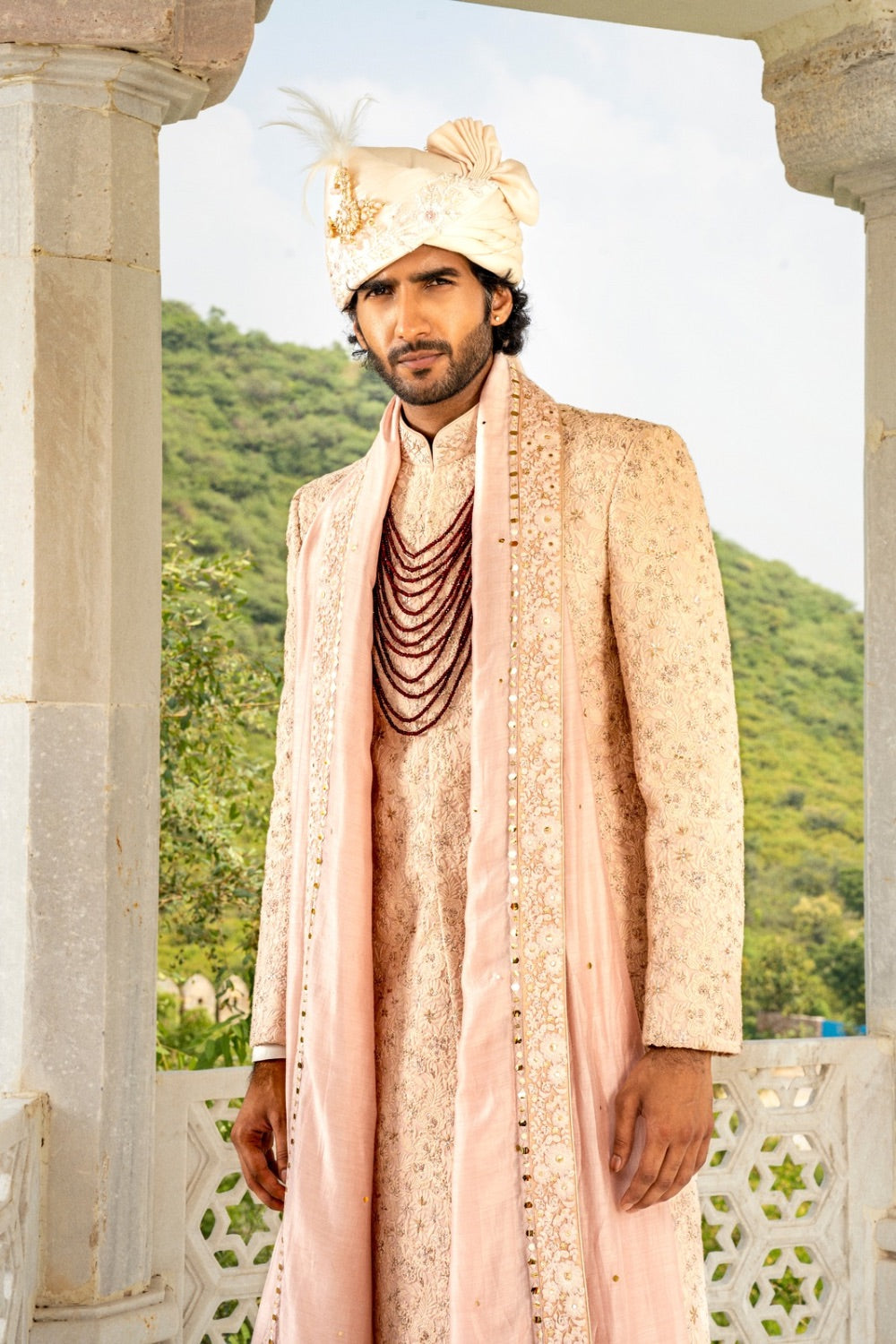 Peach lucknowi sherwani with hand cut dana and sequins work