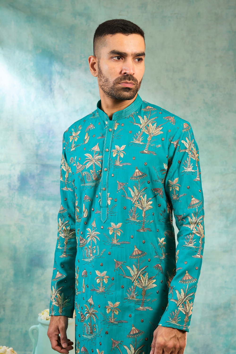 Turquoise silk kurta set with golden details