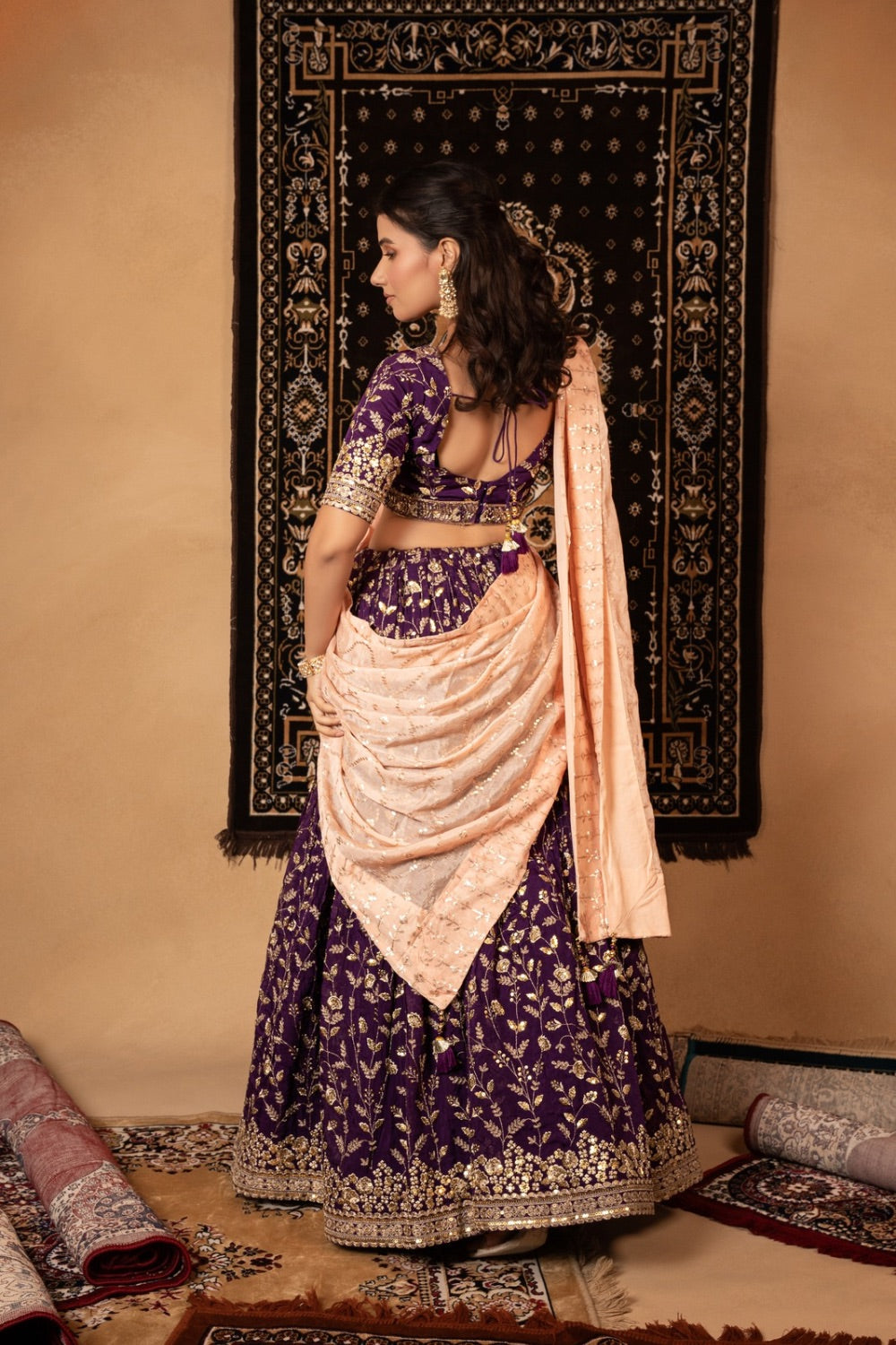 Purple organza lehenga with kasab and sequin work