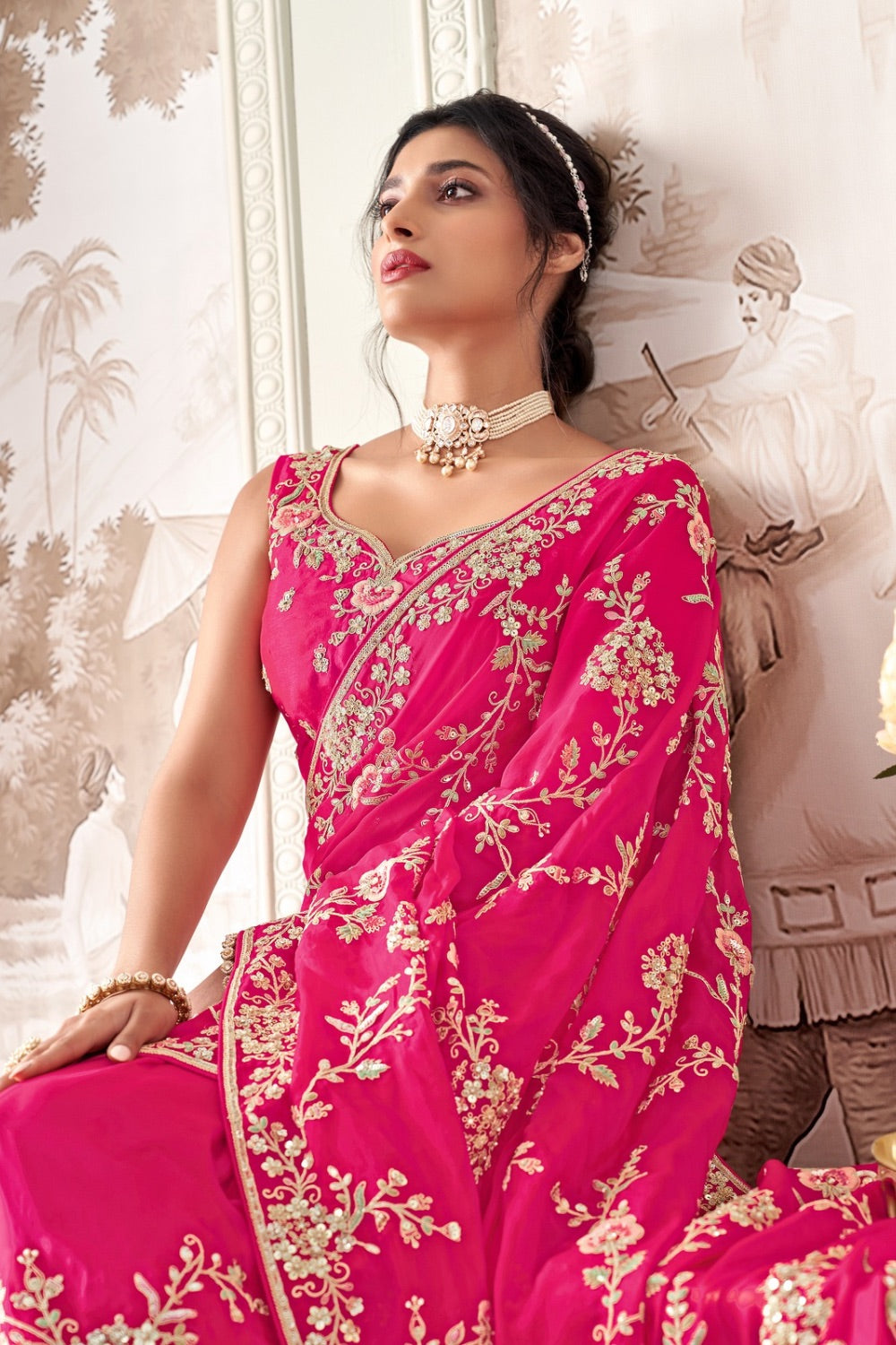 Fuchsia pink organza silk saree with matching unstitched blouse