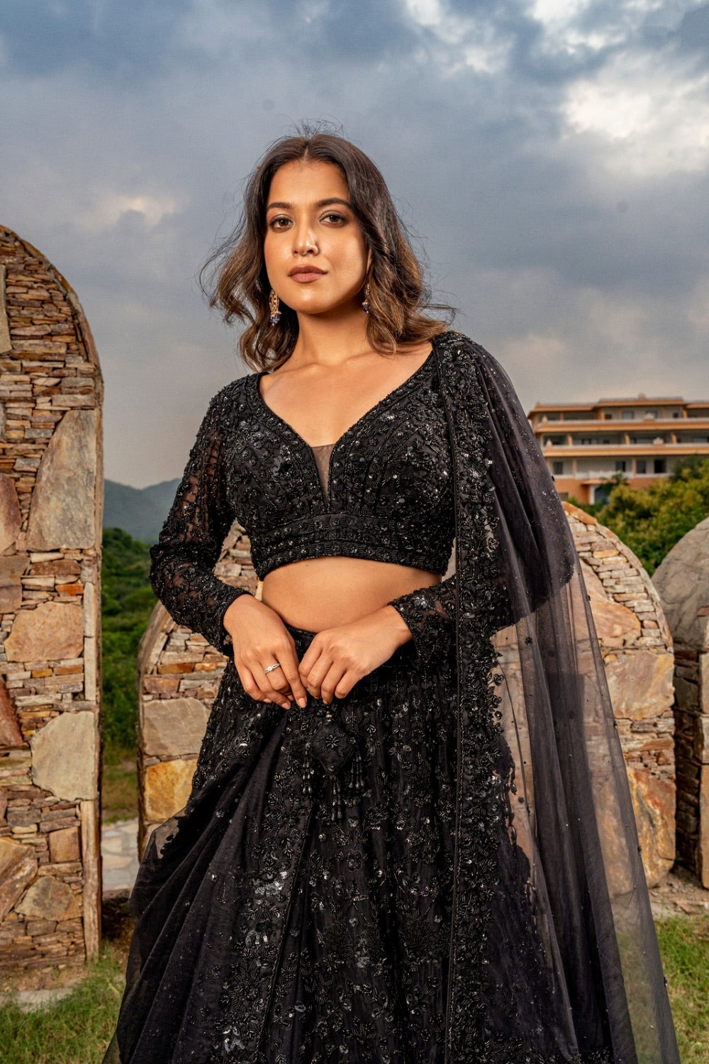 Black net lehenga choli with hand cut dana and moti work