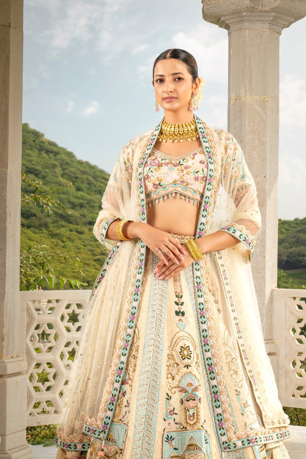 Cream raw silk zardozi embroidered lehenga choli with sequin, hand cut dana, thread and pearl work