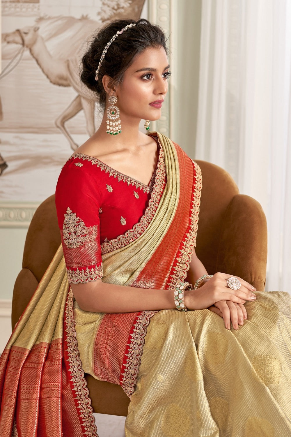 Golden banarasi silk saree with red unstitched blouse