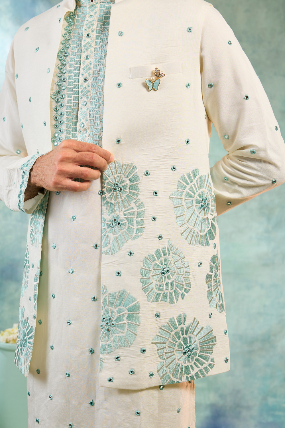 Pearl white kurta set with mint coloured thread work and mirror work