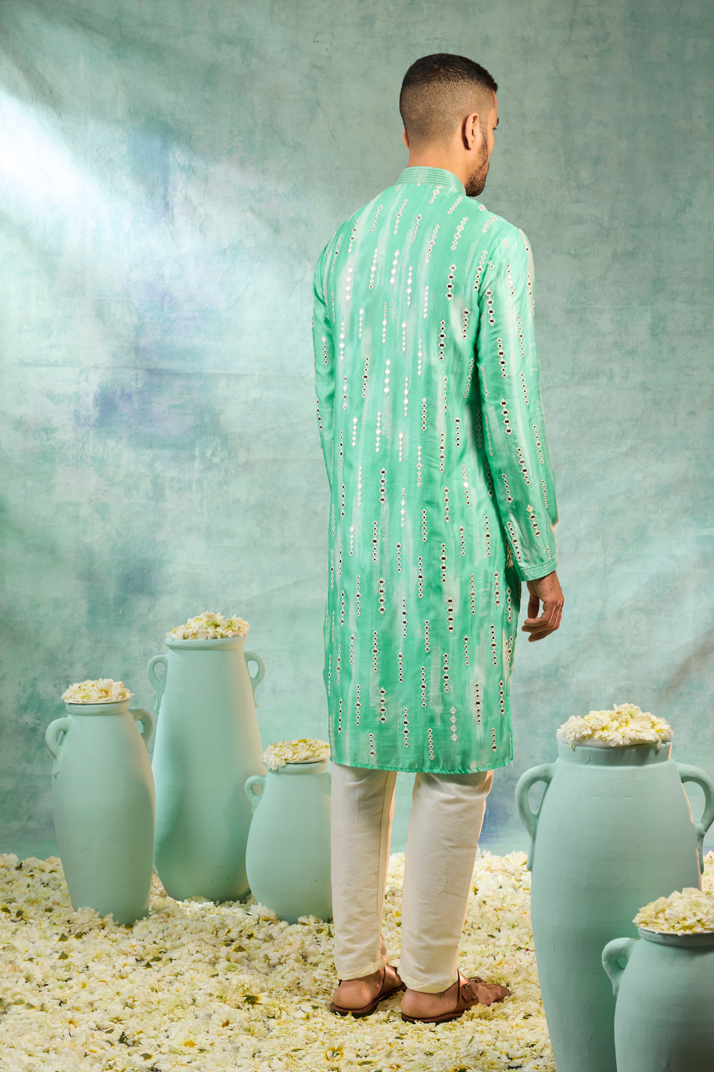 Sea green silk kurta set with off white thread work and mirror work