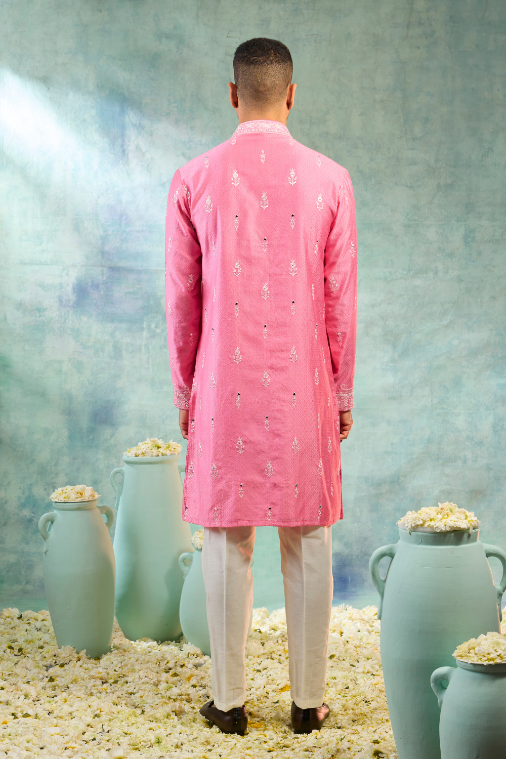 Baby pink silk kurta set with white detailing and mirror work