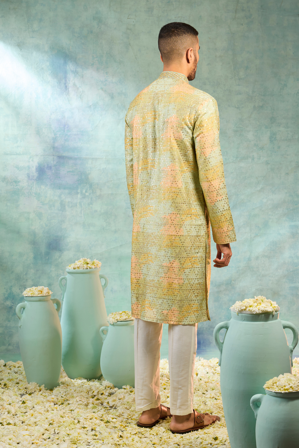 Pista green silk kurta set with thread and sequin work