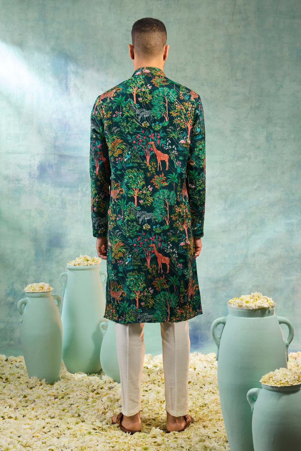 Deep green kurta set with forest print work