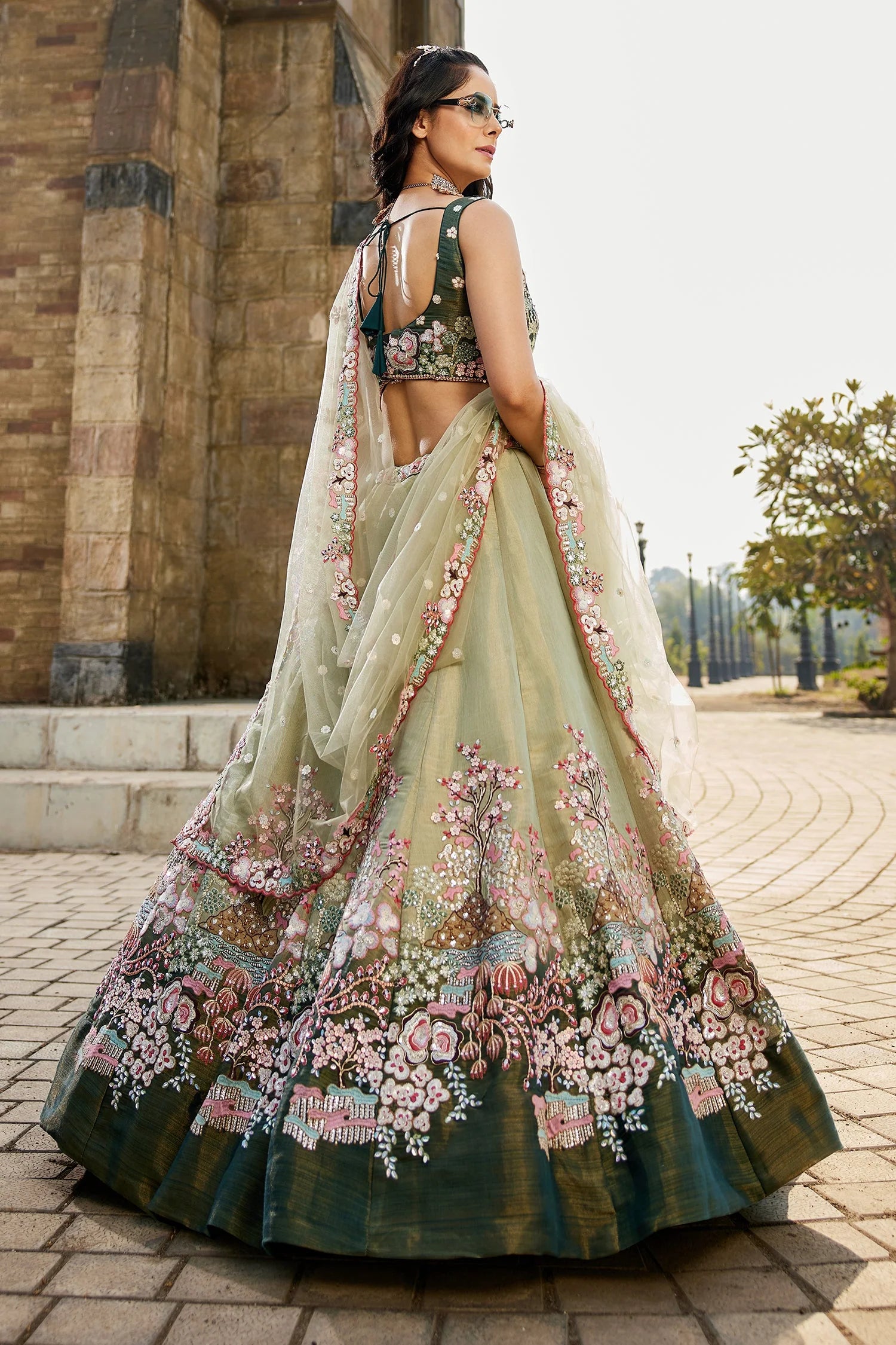 Floral Embroidered Green Net Lehenga with Sequins & Flared Silhouette