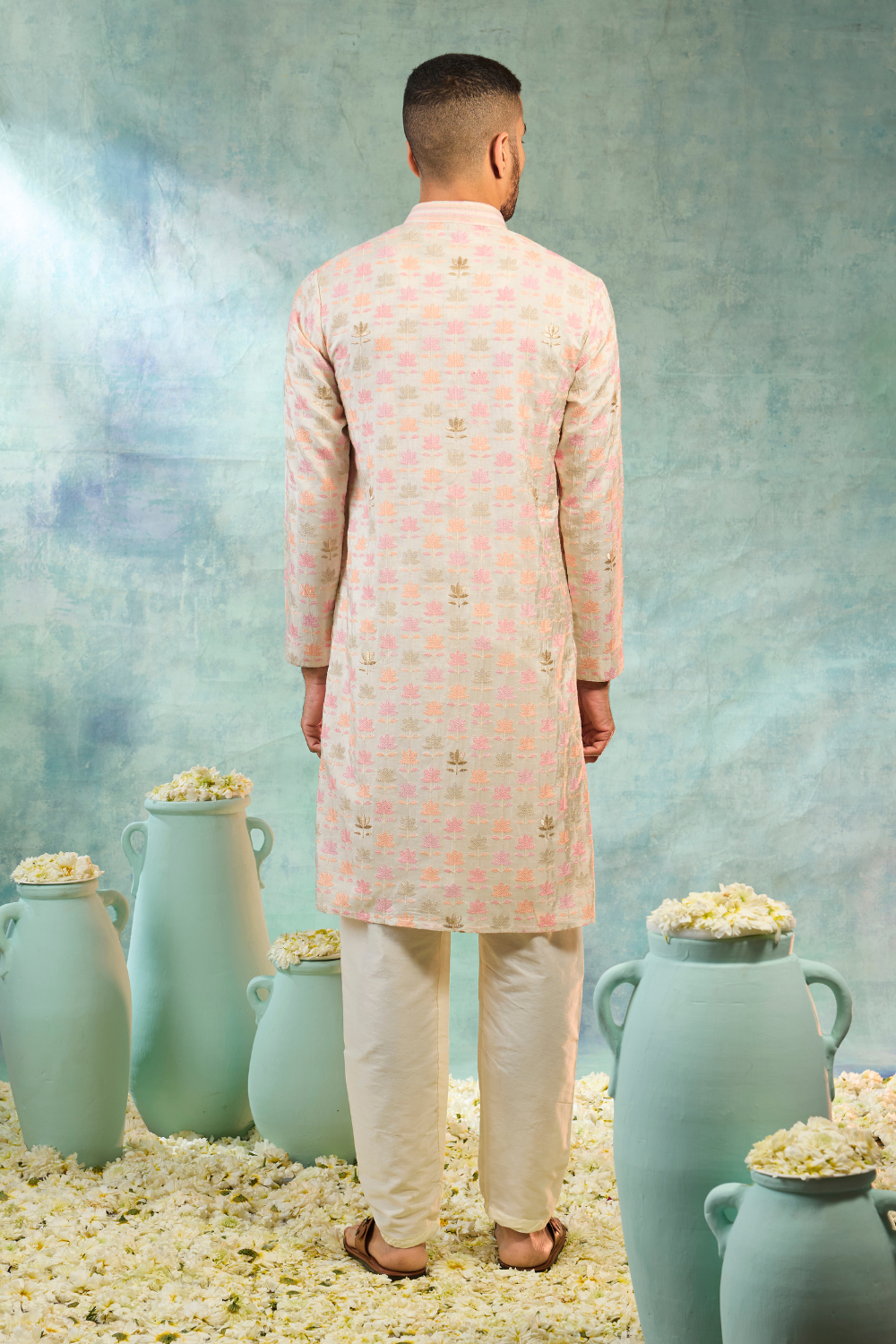 Ivory silk kurta set with baby pink and ivory thread work and golden butti